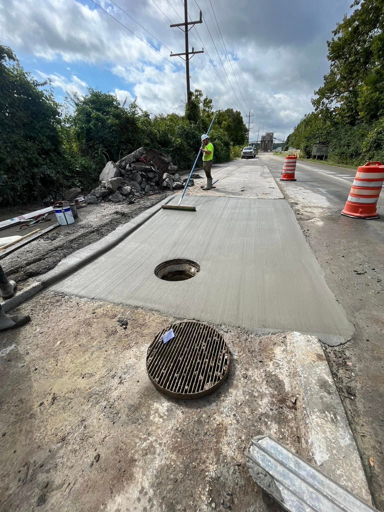Commercial concrete curb and sidewalk road pour on a city street