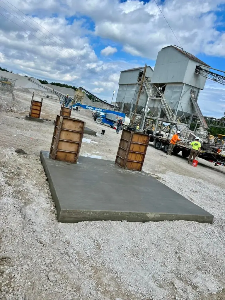 Concrete foundation wall pour prep with form panels by Spencer's