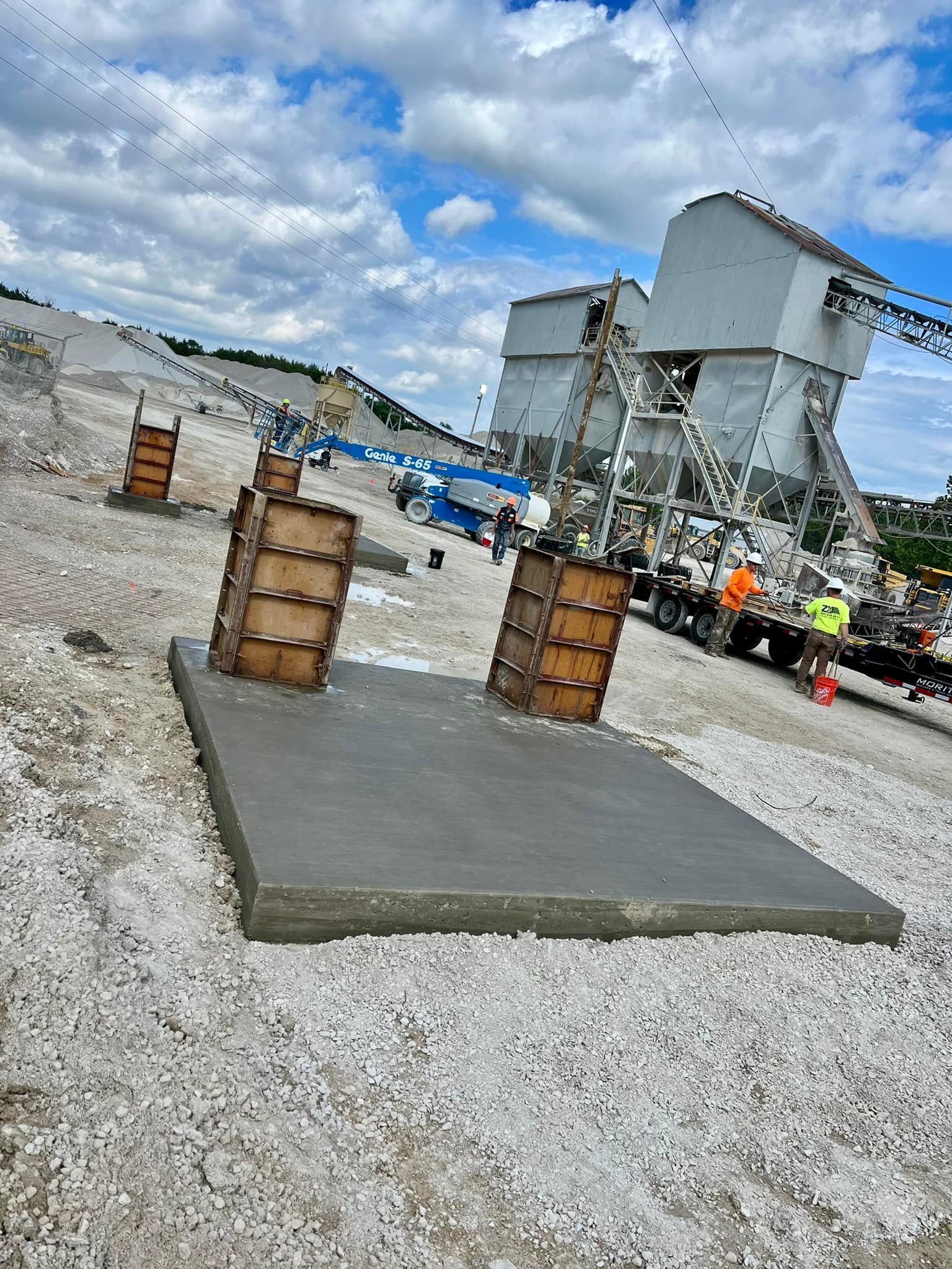 Concrete foundation wall pour prep with form panels by Spencer's